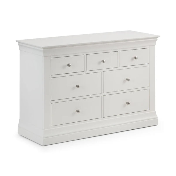 White dresser with multiple drawers on a white background