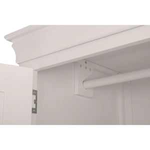 Clothing rack mounted on a white wall with a neutral background