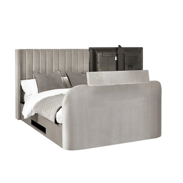 Gray upholstered bed with pull-out TV on a white background