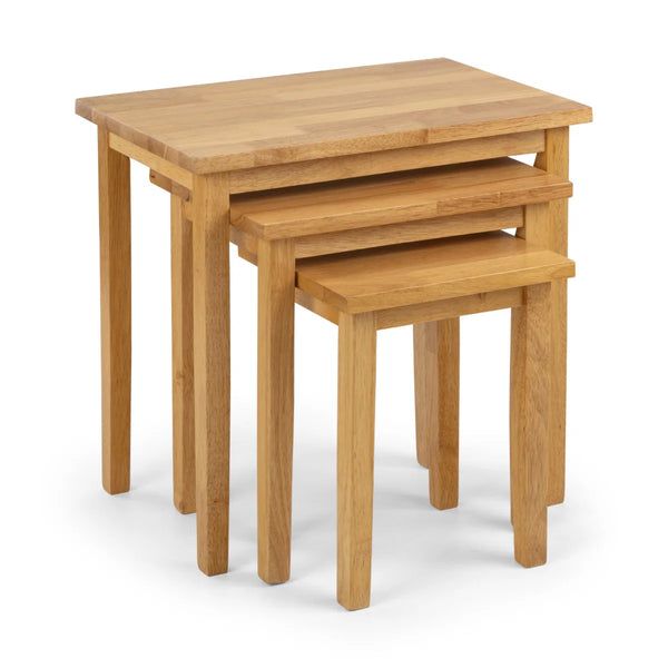 Set of three wooden nesting tables on a white background