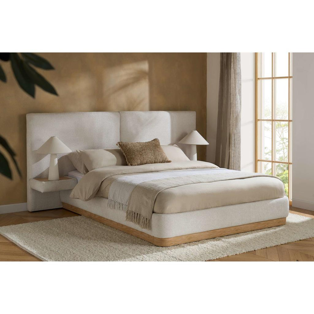 Modern bed with white mattress and wooden frame on a white background