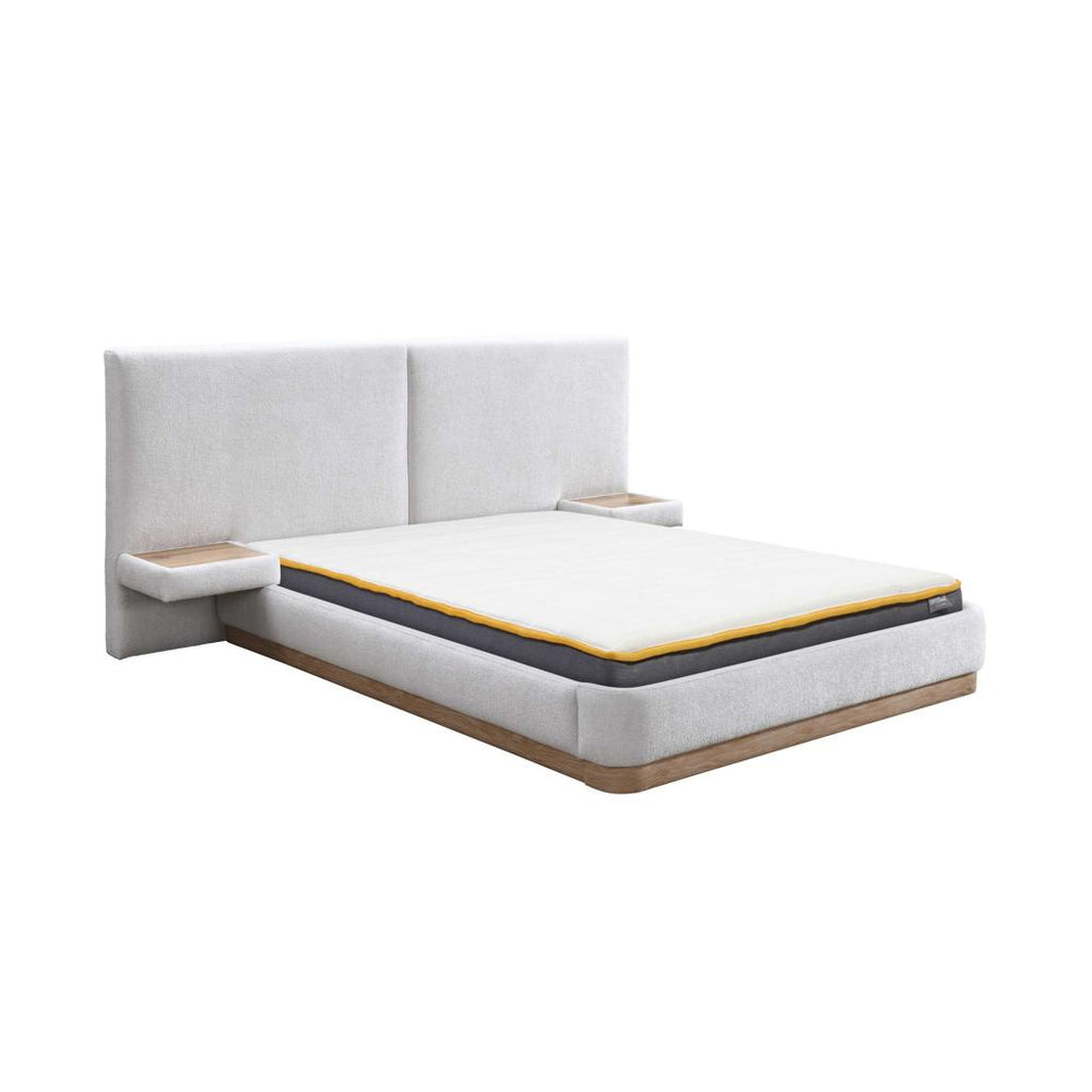 Modern bed with white mattress and wooden frame on a white background