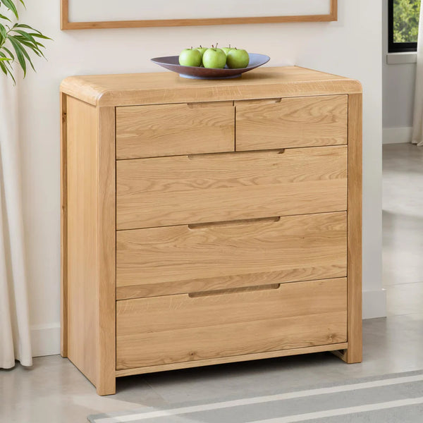 Wooden dresser with three plus 2 drawers in a room setting