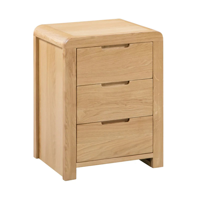 Wooden nightstand with three drawers on a white background