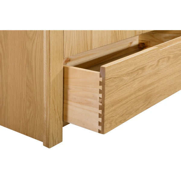 Wooden drawer of a piece of furniture on a white background