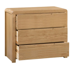Wooden dresser with three drawers on a white background