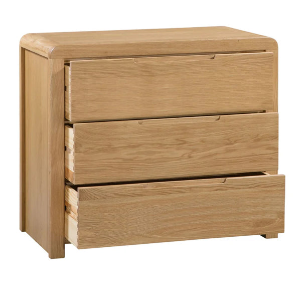 Wooden dresser with three drawers on a white background