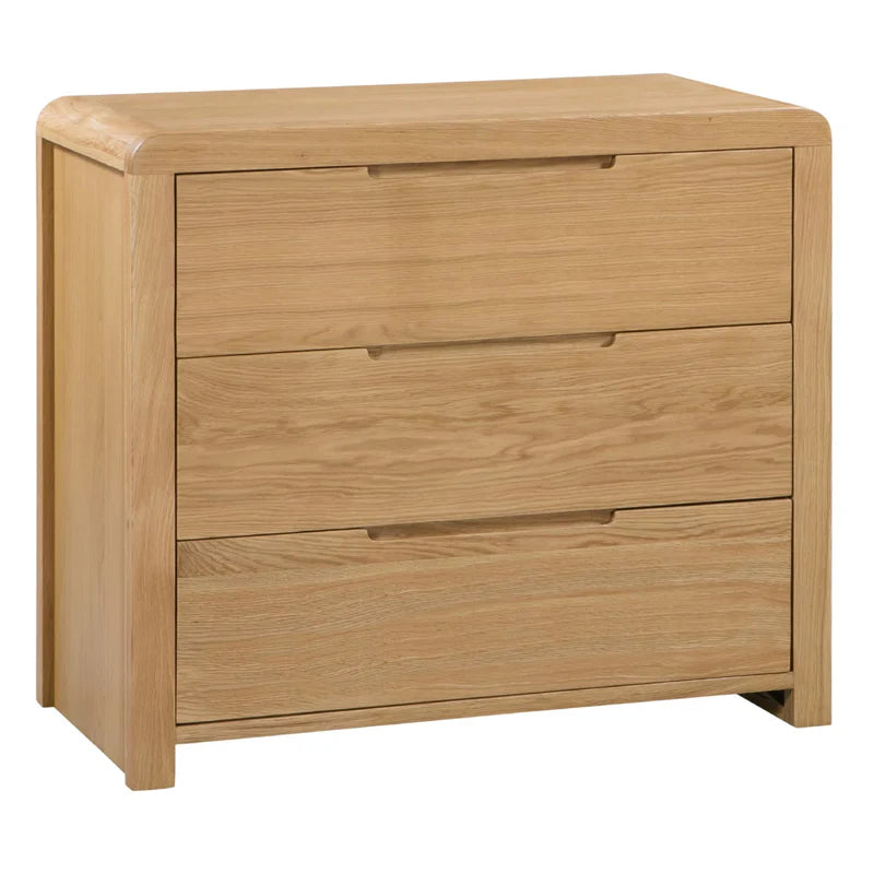 Wooden dresser with three drawers on a white background