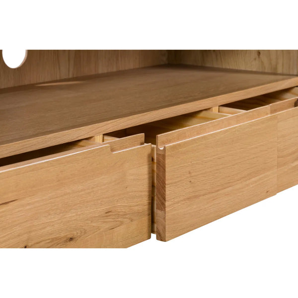 Wooden drawer unit with open drawers on a white background