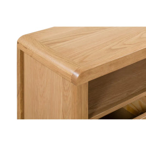 Close-up of a wooden corner unit with a white background