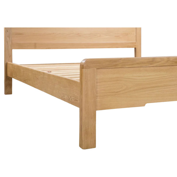 Wooden bed frame on a white background