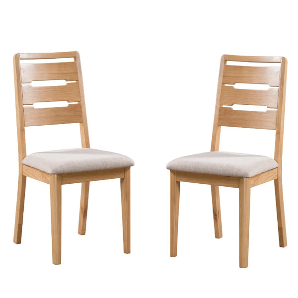 Two wooden chairs with beige cushioned seats on a white background