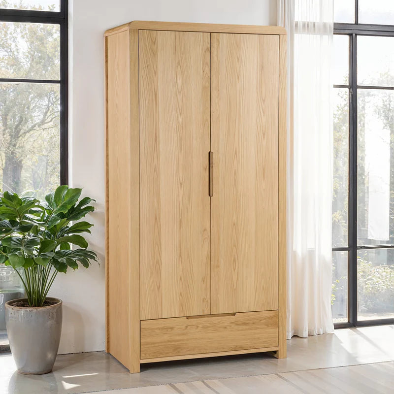 Wooden wardrobe with two doors on a white background