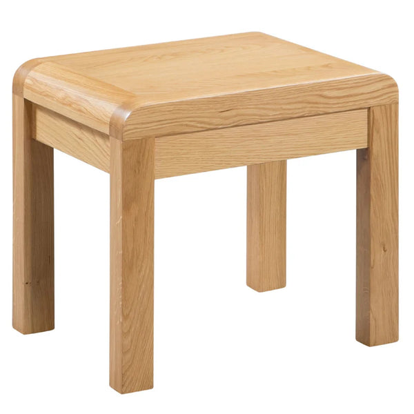 Wooden stool with a light brown finish on a white background
