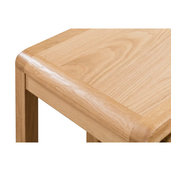 Close-up of a wooden stool with a white background