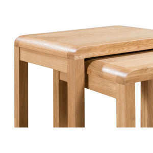 Wooden table and stool set on a white background