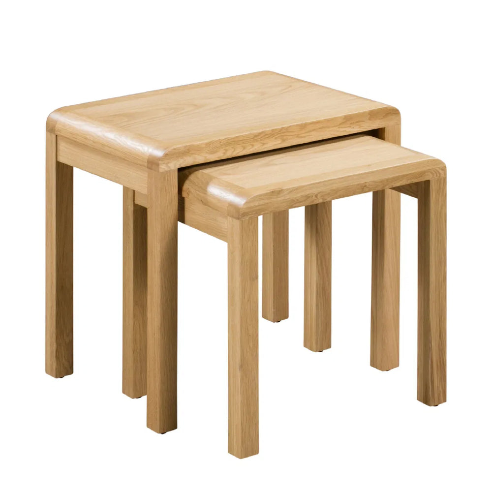 Set of two wooden nesting tables on a white background