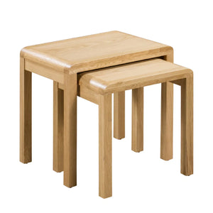 Set of two wooden nesting tables on a white background