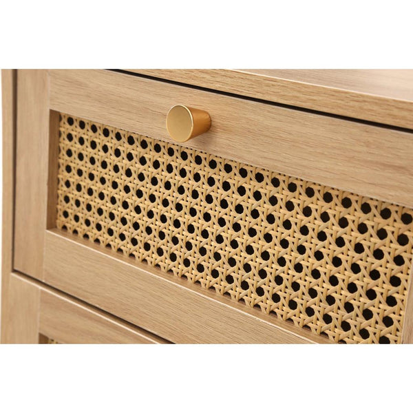 Wooden drawer with rattan panel and gold handle on a white background