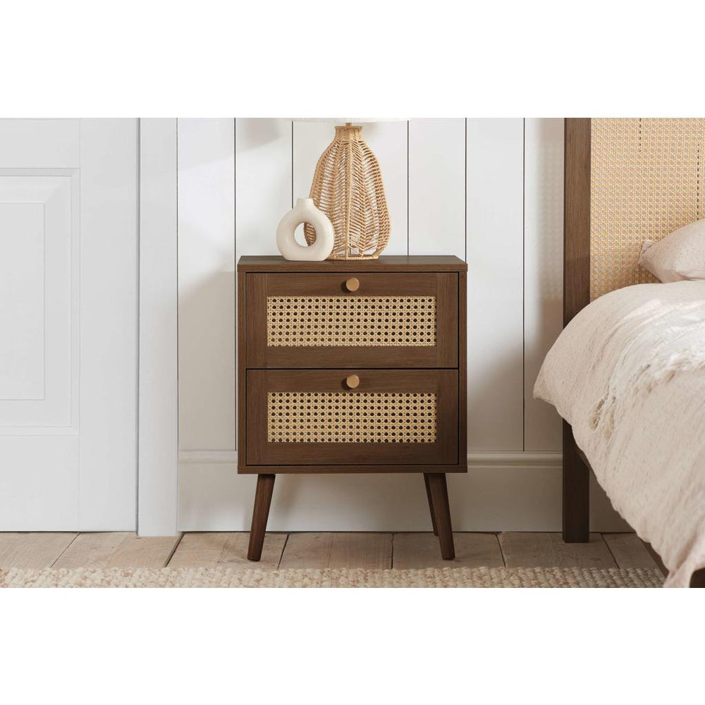 Wooden nightstand with two drawers on a white background
