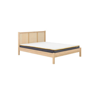 Wooden bed frame with a mattress on a white background