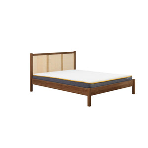 Wooden bed frame with mattress on a white background