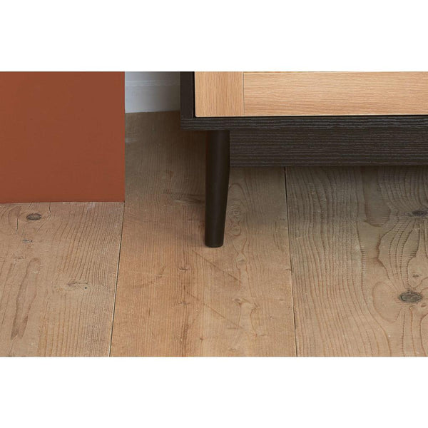 wooden leg of wardrobe on wooden floor