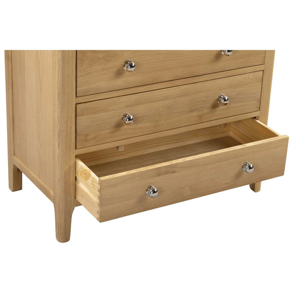 Wooden dresser with open drawer on a white background