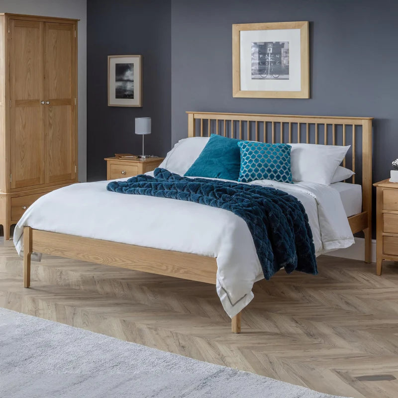 Wooden bed frame on a white background