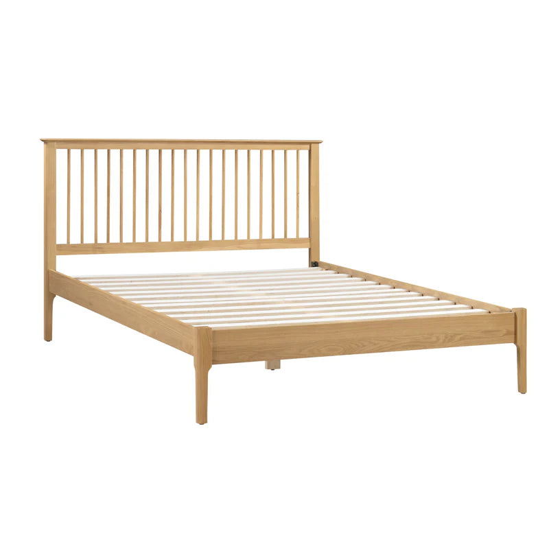 Wooden bed frame on a white background
