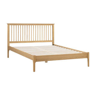 Wooden bed frame on a white background