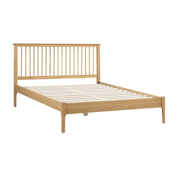 Wooden bed frame on a white background