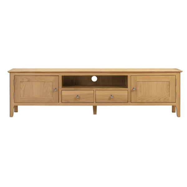 Wooden TV stand with multiple compartments on a white background
