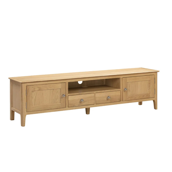 Wooden TV stand with doors and drawers on a white background