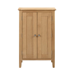Wooden cabinet with two doors on a white background