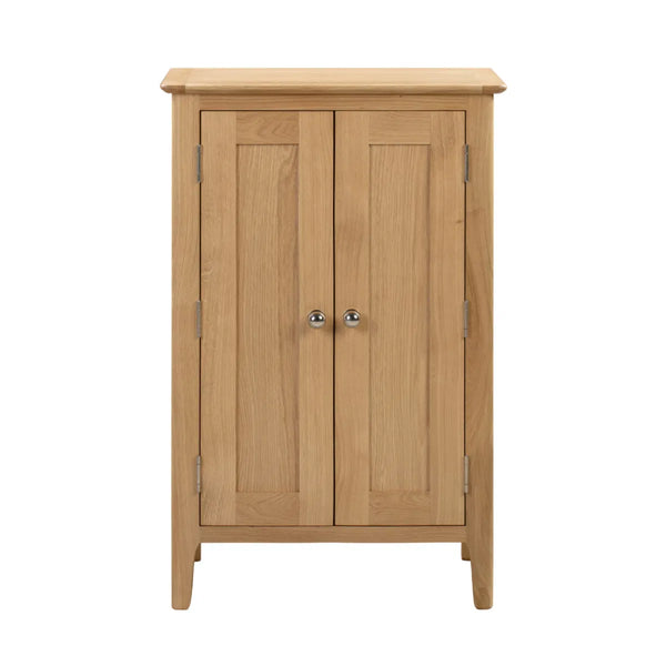 Wooden cabinet with two doors on a white background