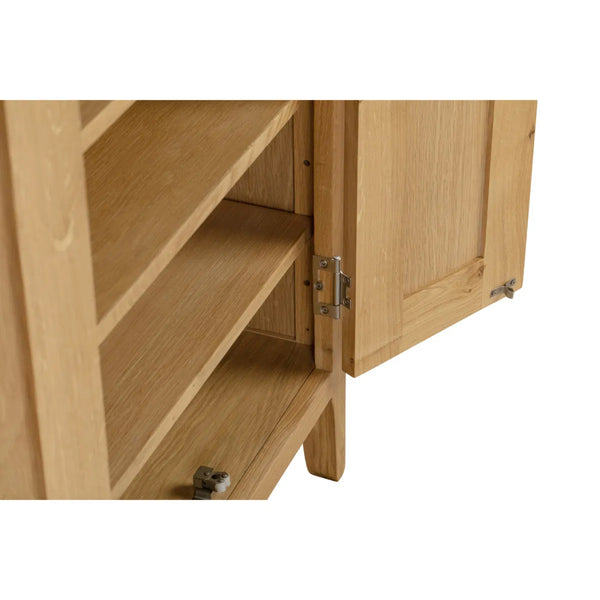 Wooden cabinet with open door on a white background