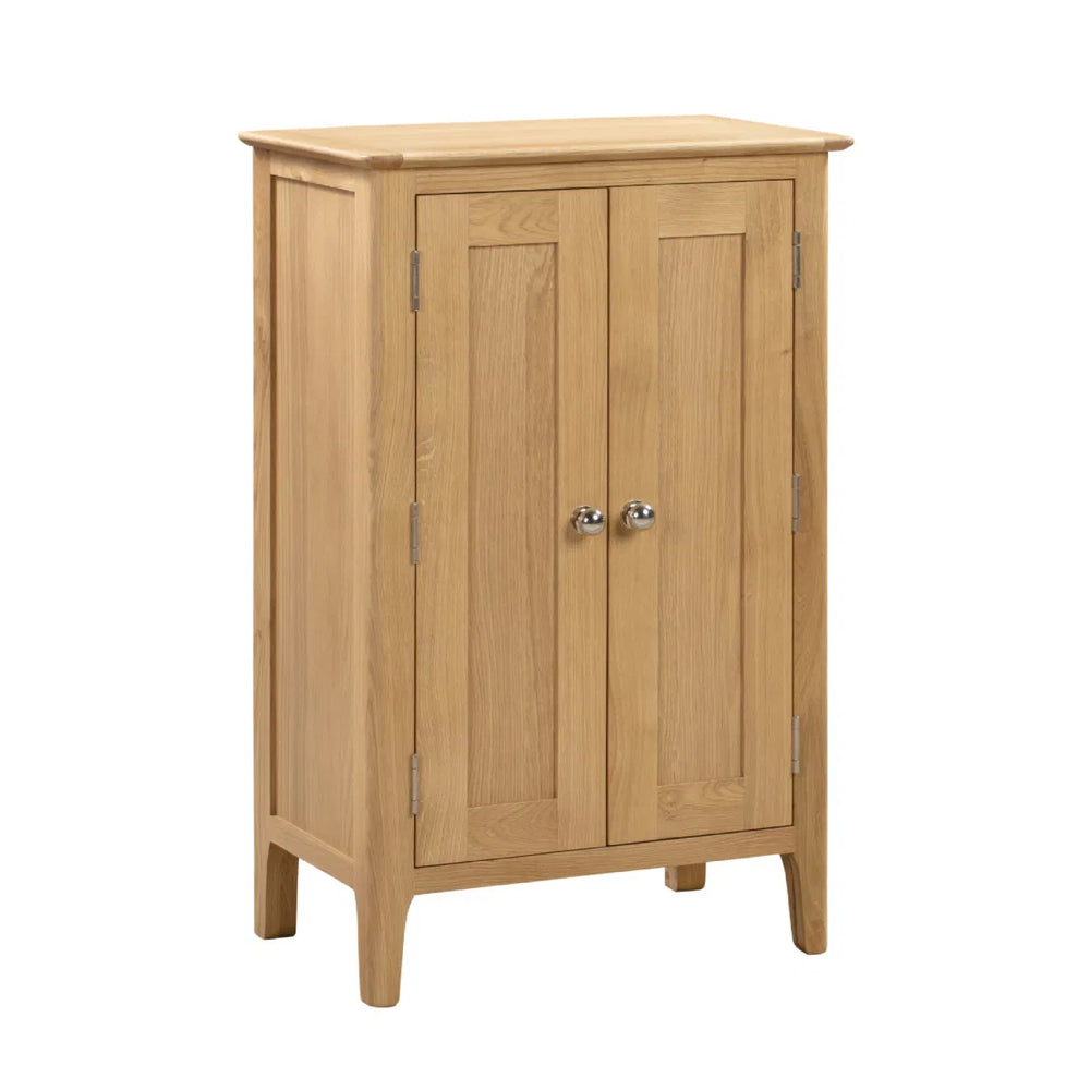 Wooden cabinet with two doors on a white background