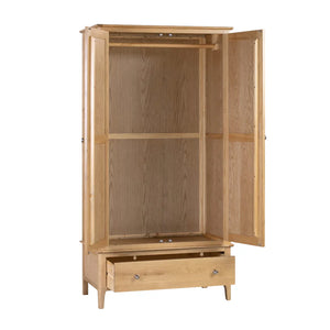 Wooden wardrobe with open doors on a white background