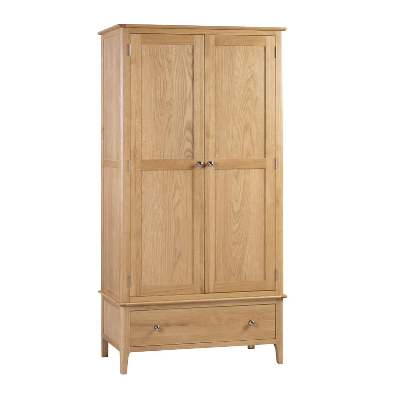 Wooden wardrobe with two doors and a drawer on a white background