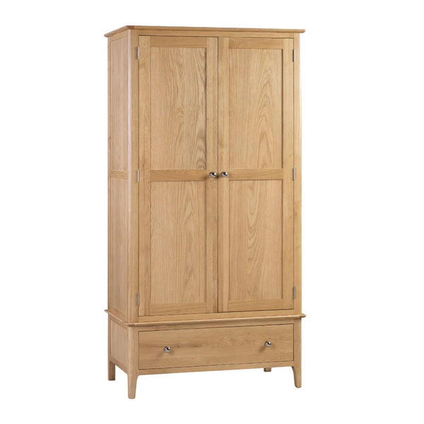 Wooden wardrobe with two doors and a drawer on a white background