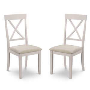 Two white chairs with beige seats on a white background