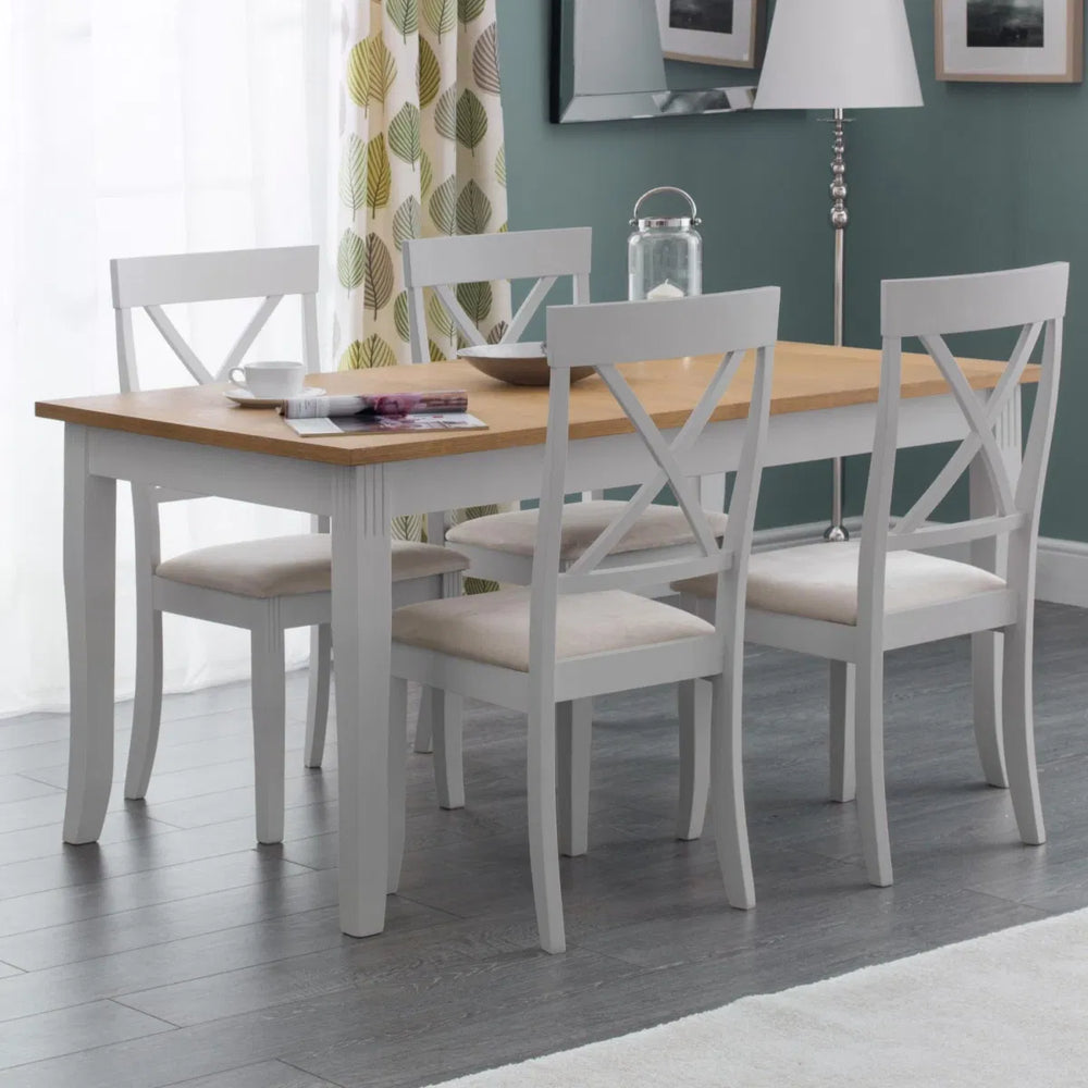 Wooden table with white legs on a white background
