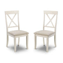 Two white chairs with beige seats on a white background