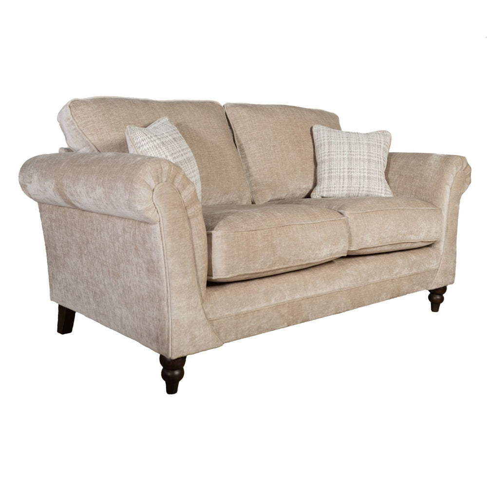 Beige sofa with plaid cushions on a white background