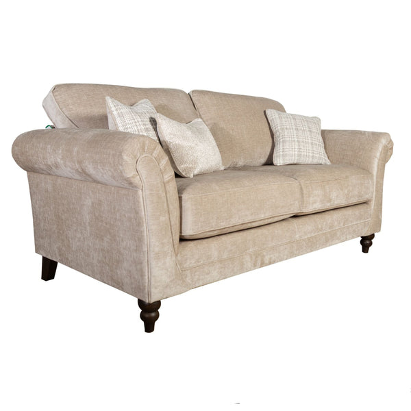 Beige sofa with cushions on a white background