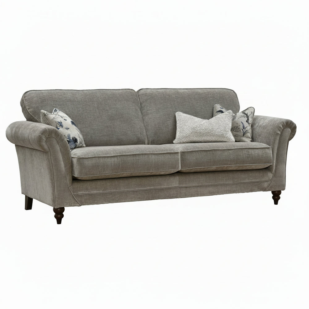 Gray sofa with decorative pillows on a white background