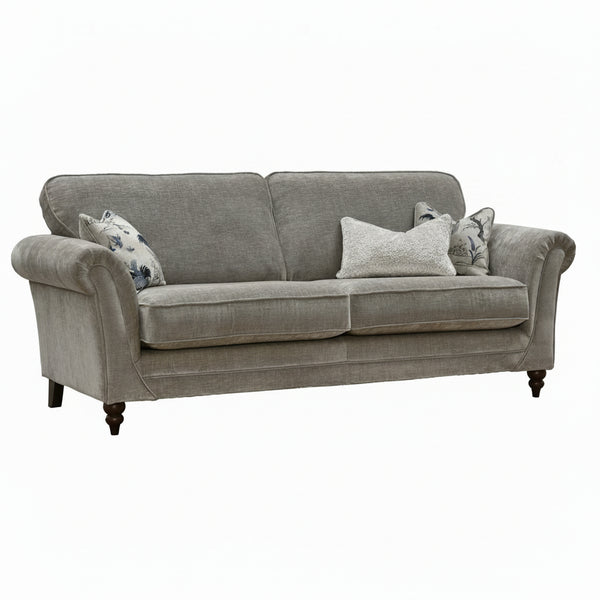 Gray sofa with decorative pillows on a white background