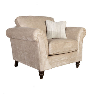 Beige armchair with a striped pillow on a white background