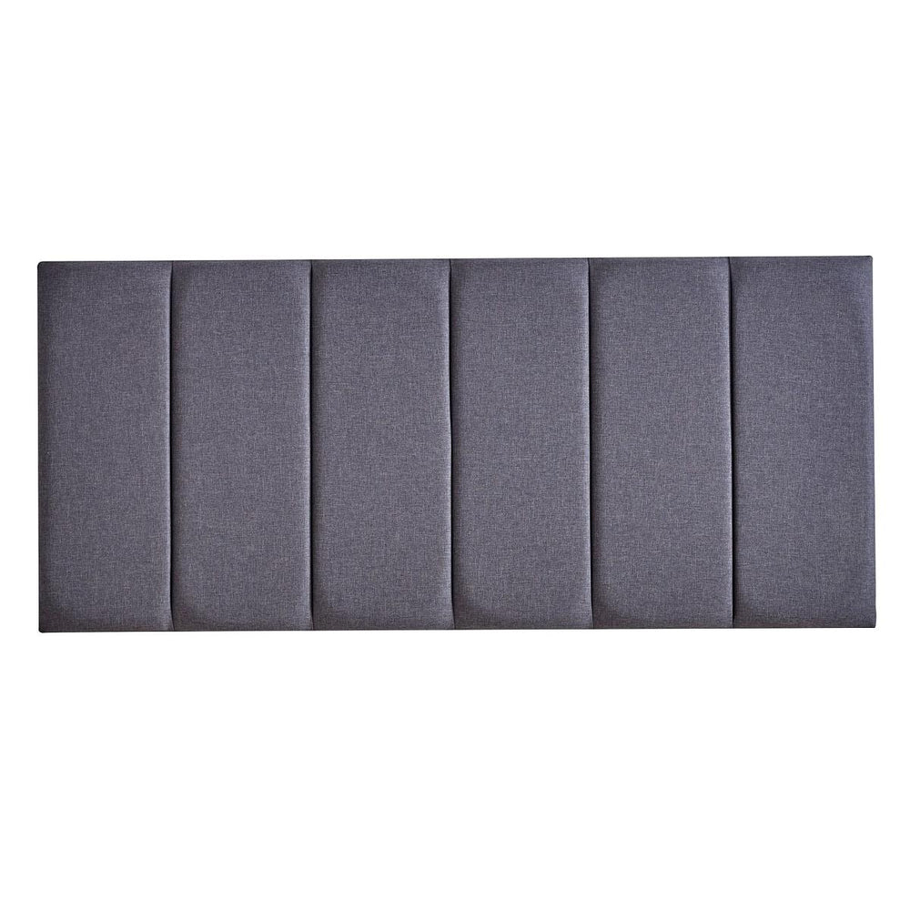 Gray upholstered headboard with a pleated design on a white background